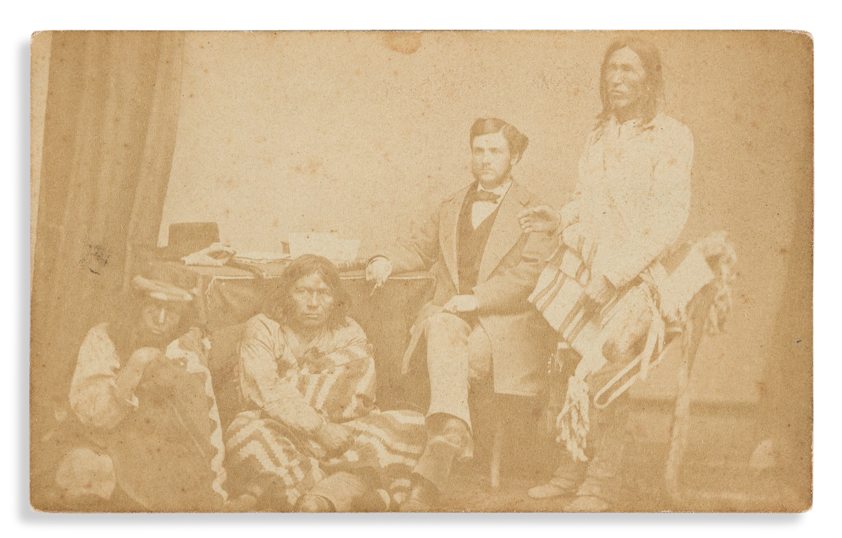 (AMERICAN INDIANS--PHOTOGRAPHY.) Group of 9 cartes-de-visite of Indians and street scenes by early New Mexico photographers.